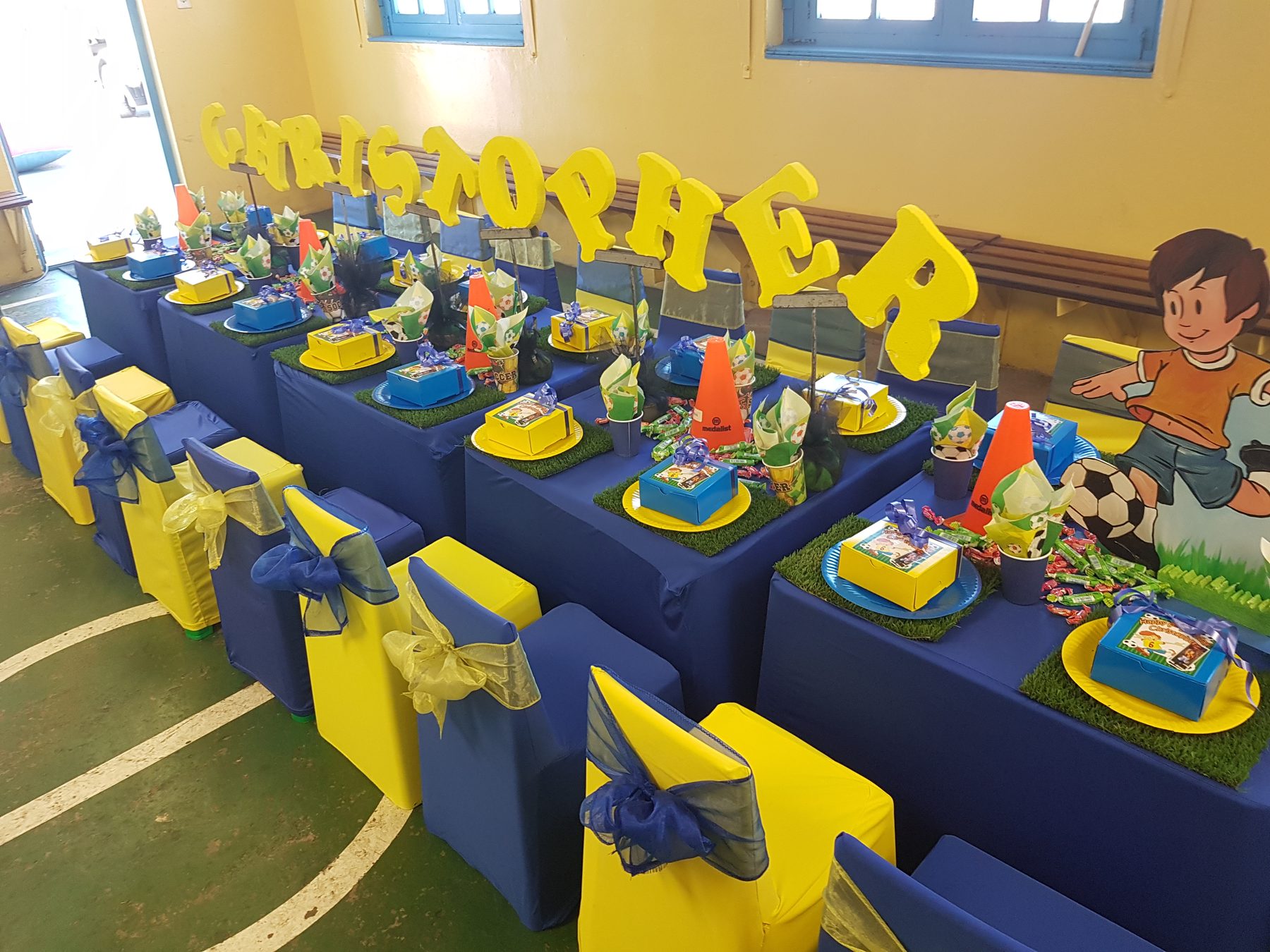 Batman inspired blue and yellow party setup