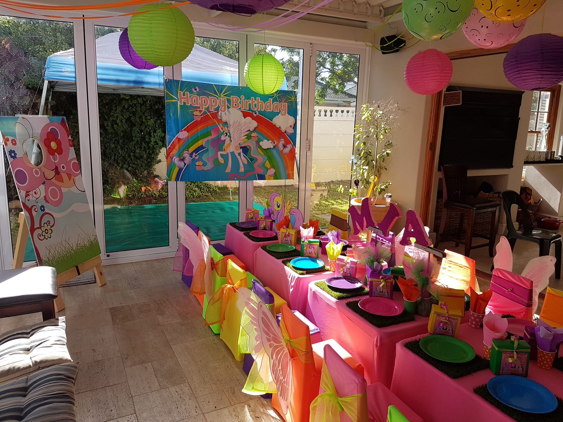 Colourful indoor unisex party table setup