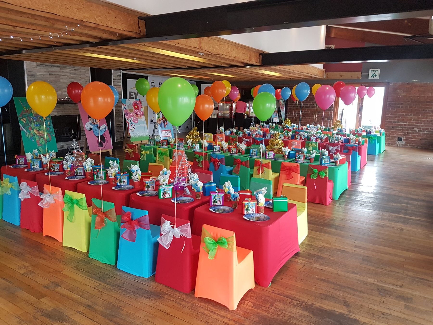 Large colourful unisex birthday party setup