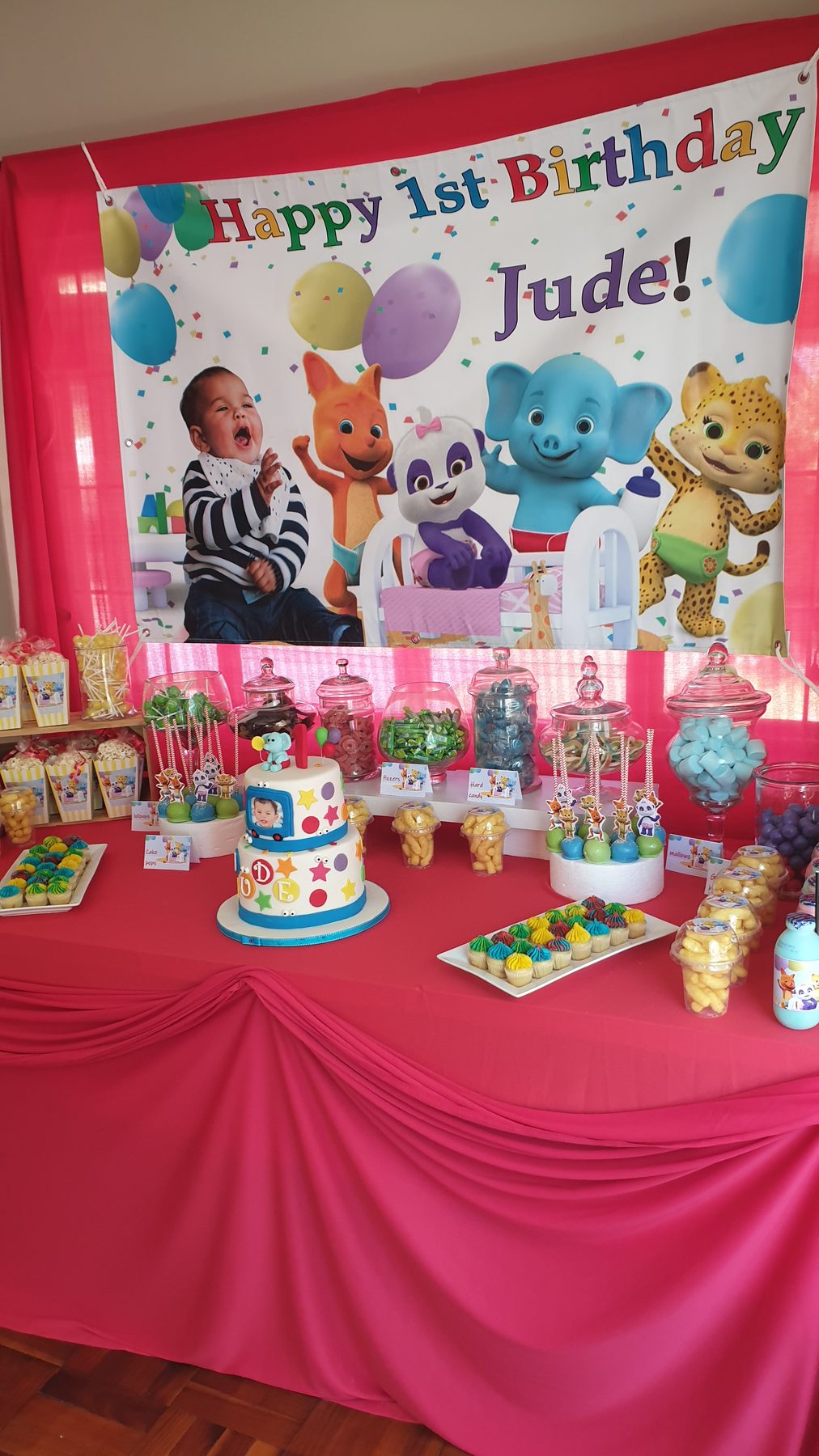 Candy table setup with themed birthday treats